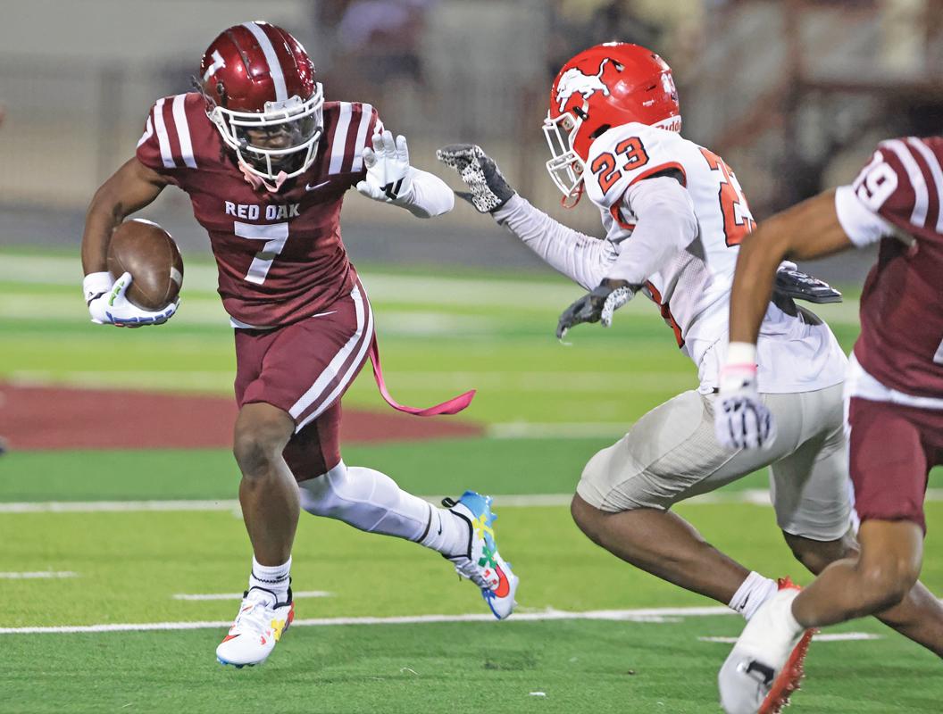 Wide Receiver Rodney Malone (7) stiff arms the Lions Safety to get around the edge on this catch and run.