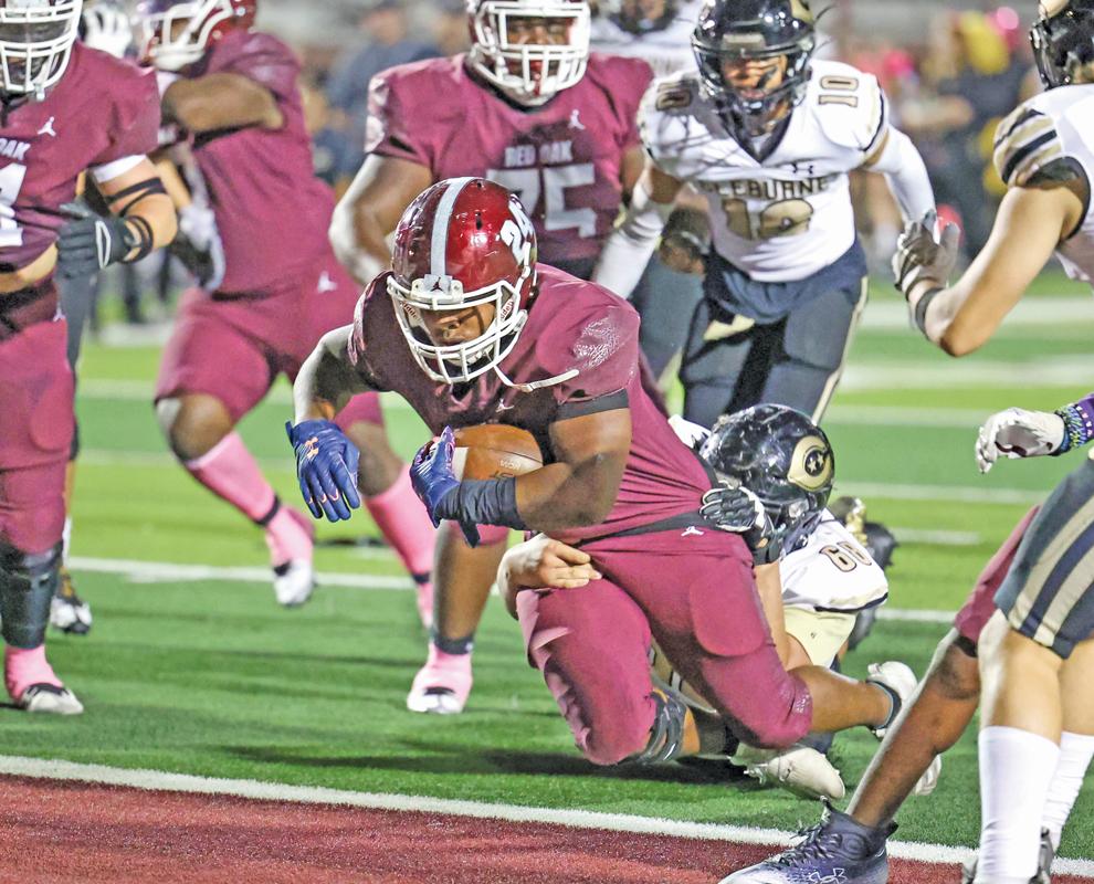 Senior RB Noah Johnson (24) scores on a 4-yard run late in the 4th quarter. Photo by Steve Patterson / Moving Pictures.