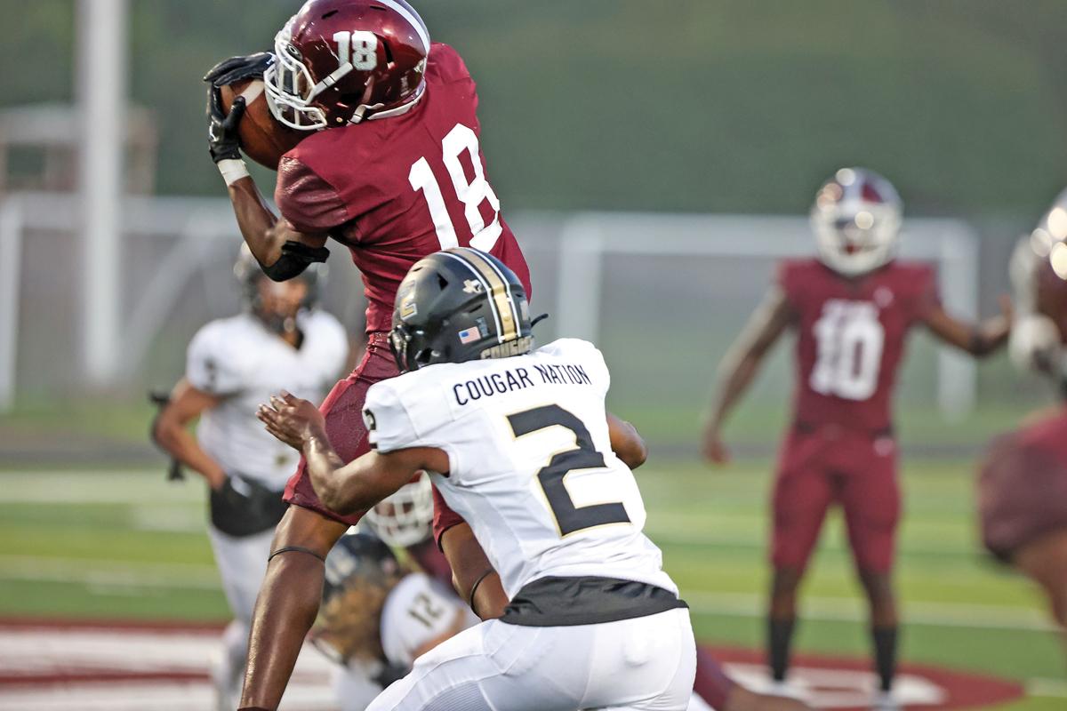 WR Brayden Robinson (18) gets another Hawks 1st down with this catch from QB Jaylon Robinson (10) in the 3rd quarter.