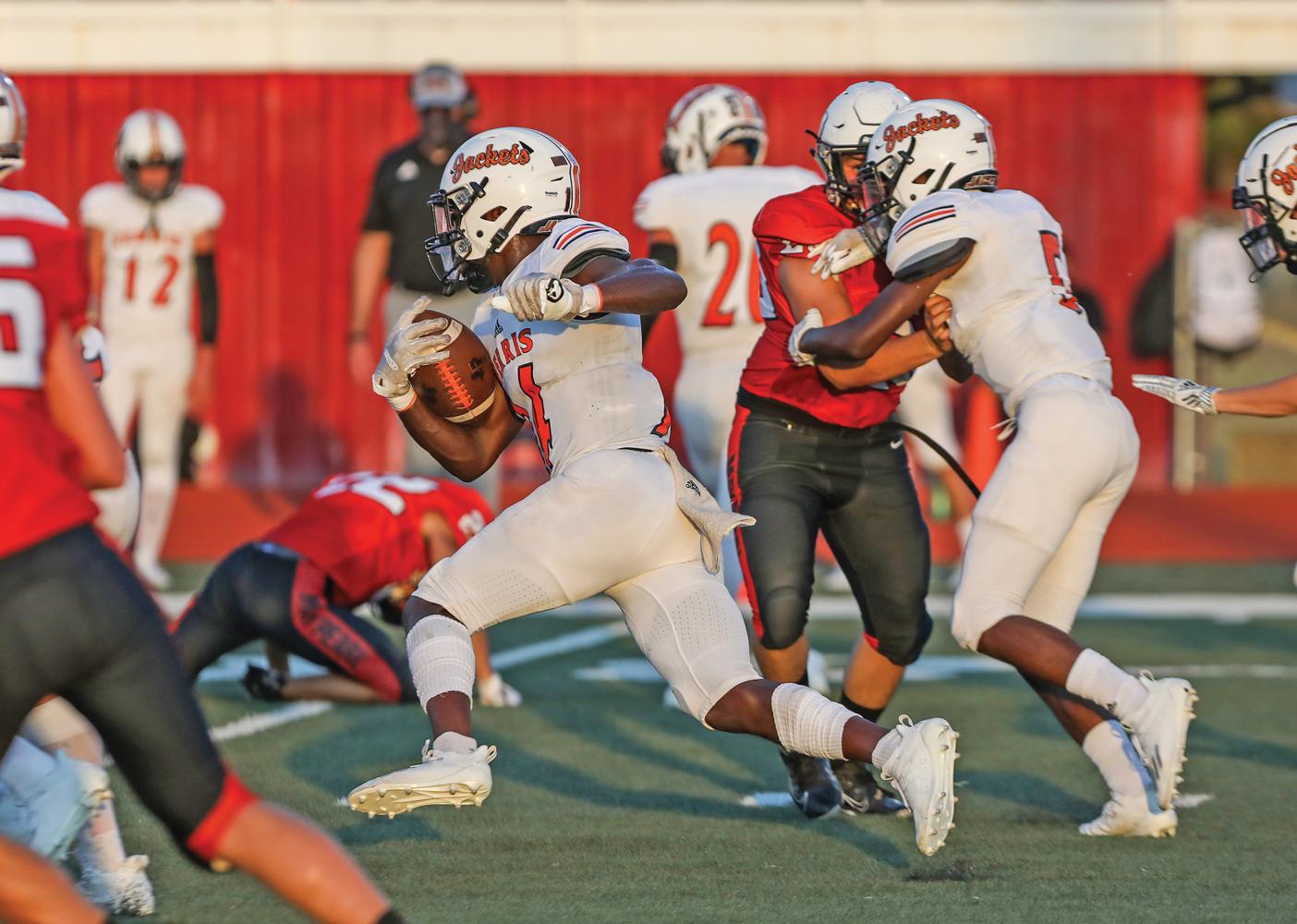Demarcus Rankin (14) turned on the jets and raced down field on this kick-off return to put Ferris on the board. Photo by Steve Patterson / Moving Pictures.