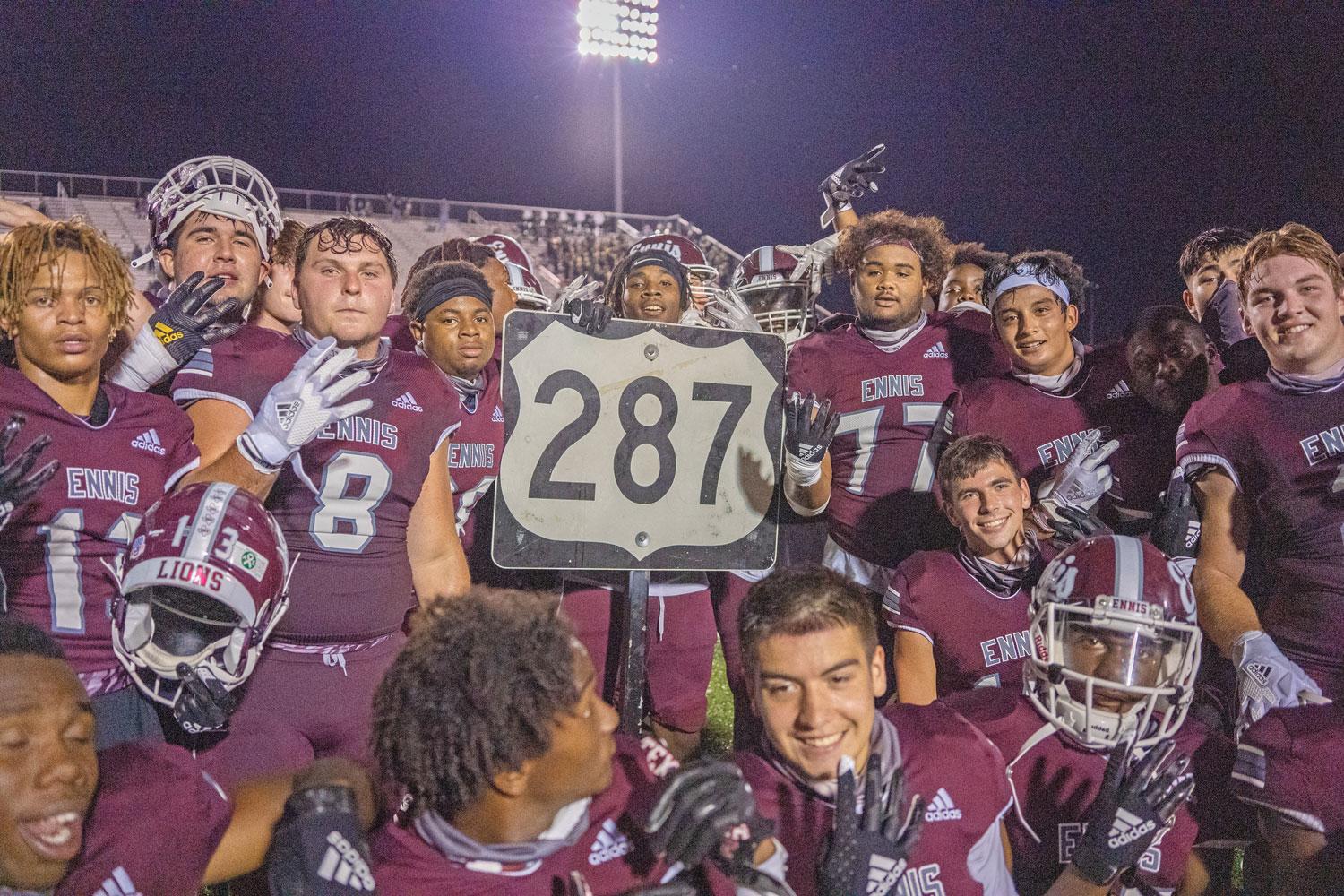 The Ennis Lions get to return the famed 287 Battle trophy to its resting place in the Ennis fieldhouse after winning the 99th match against long time rival Waxahachie Indians. Photo by Kirk Holt.
