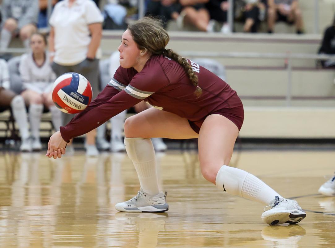 Senior Chloe Munoz (18) with one of her many season digs inches off the floor.