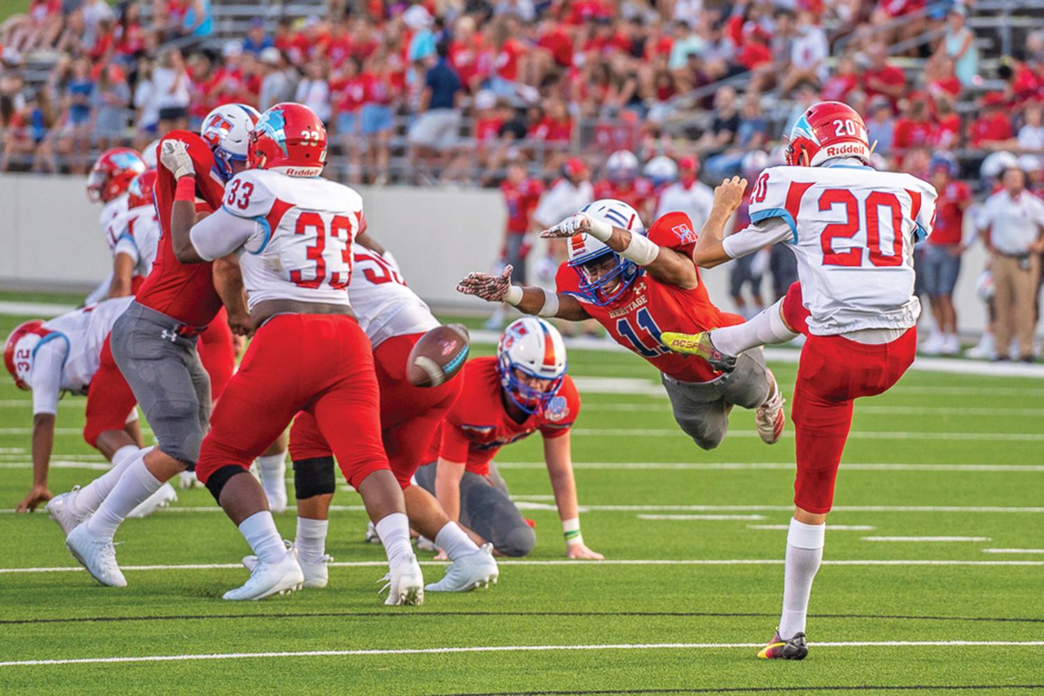Derwin Sneed (11) blocked a punt for a turnover and a Jaguar TD 2 plays later. Photo by Kirk Holt.