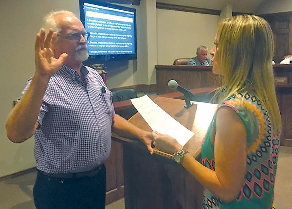 David Maki was appointed to the Planning & Zoning Commission Monday and is shown taking the “Oath of Office.”