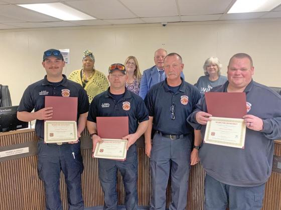 The Wilmer City Council recognized a number of their firefighters at last week’s council meeting for outstanding service. From left to right (front row): FF Dylon Diaz, FF Kevin Driggars, Interim Fire Chief Eddie Harris and Captain Jason Hogan, (back row) City Council members Pamela Wash, Laura Jacobs, Mayor Pro Tem Jeff Steele and Mayor Sheila Petta.