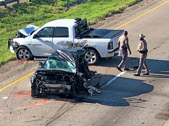 The Black 2015 Nissan Altima, driving north in the middle lane of the southbound side of I-45, hit the silver 2003 Honda Civic head-on, then came to a stop in the southbound left lane where it was then struck by a white Dodge Ram pickup that was southbound on the interstate. 