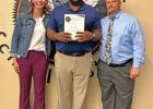FJH Assistant Principal Shandra Sanders, with FJH Teacher of the Month Larry Taylor, and FJH Acting Principal T.J. Knight.