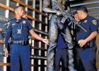 Members of law enforcement escorted the 1,000 pound statue of Chris Kyle and prepare to unload it at the Waxahachie Civic Center Thursday morning after moving it from Rockwall.