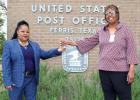 Ferris Postmaster Wanda Curry is seen here passing off the keys to incoming Postmaster ShaRon Tolliver. Tolliver is looking forward to serving the Ferris area. 