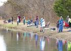Fishermen lined the banks of Red Oak Municipal Lake hoping to catch a legal-size Trout.