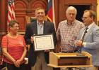 David Sacha receives the Distinguished Service Award at the August 9th Commissioners Court meeting.