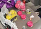 The vehicle search produced approximately 25 to 30 small canisters of what on the outside appeared to be air fresheners. 