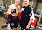 Determan shown with his dad. Photo courtesy Blue Line Boxing & Fitness.